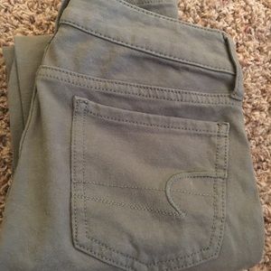 Army green American eagle skinny jeans